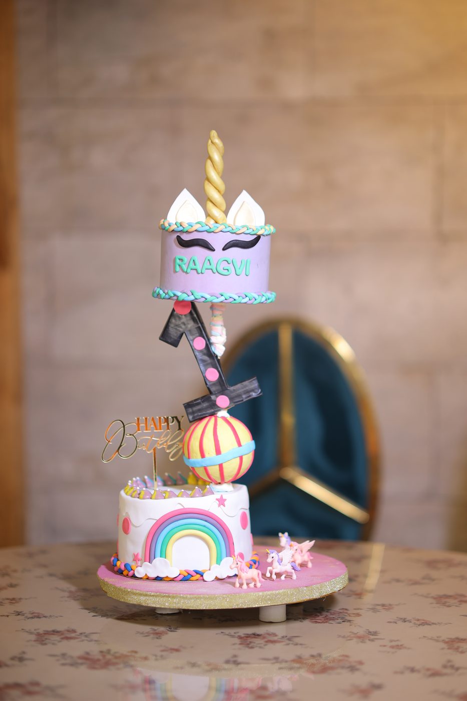 Gravity defying unicorn first birthday cake