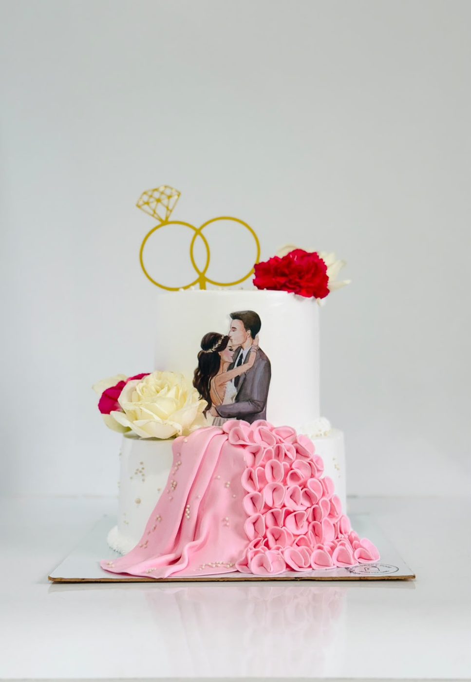 Wedding cake with hand painted couple